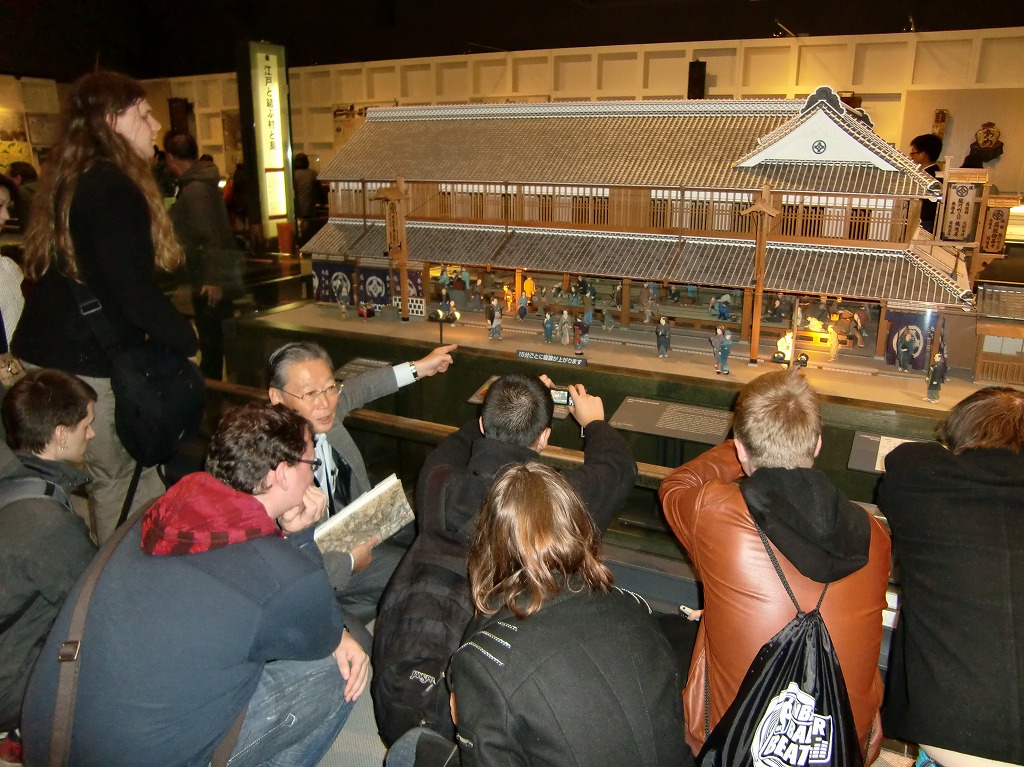 KCP students view a detailed model of the Echigoya shop in the Edo period