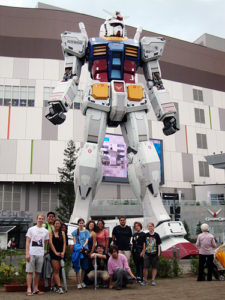 KCP student with Gundam at Odaiba