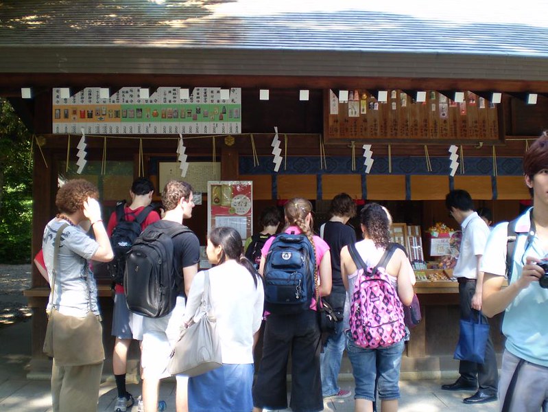 KCP students searching for good-luck charms at the entrance of the Meiji Jingu shrine.