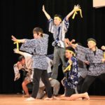 KCP students wear yellow ribbons to demonstrate the Yosakoi dance.