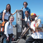 Kareem Douglas with classmates atop Mt. Fuji