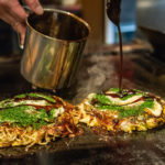 Preparing okonomiyaki