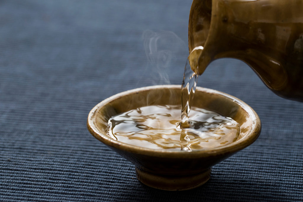 Sake being poured