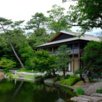 Traditional Japanese style house by a garden pond