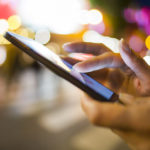 Woman using her Mobile Phone