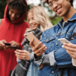Young people using cellphones