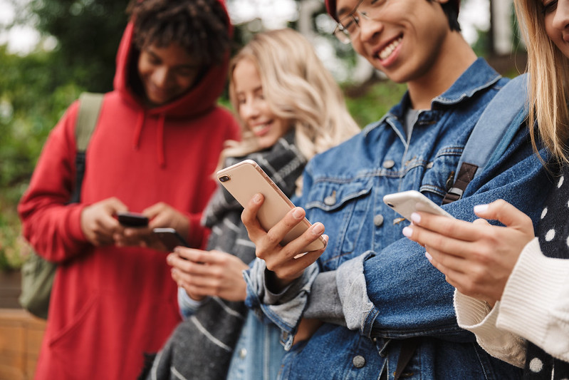 Young people using cellphones