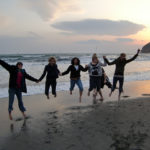KCP Students Jump on a Beach in Japan