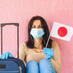 Young traveler wearing face mask
