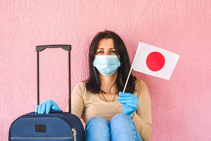 Young traveler wearing face mask