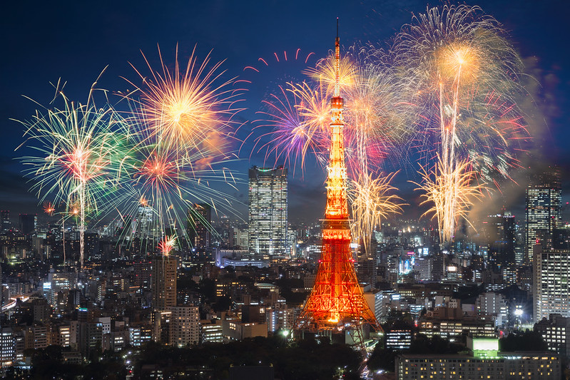 Fireworks new year celebrating over tokyo cityscape at night