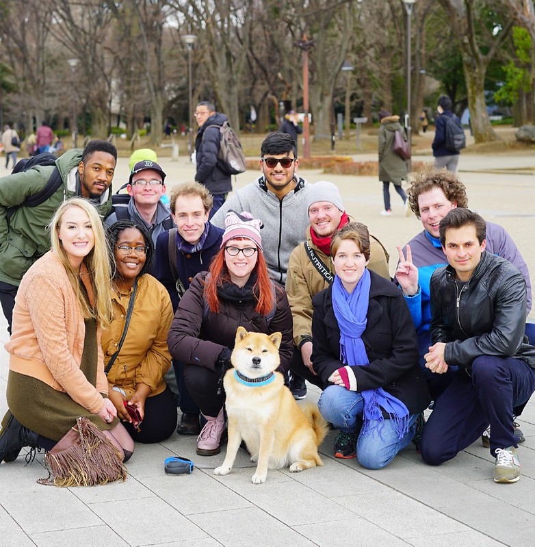 KCP students at Ueno park with Maru, the smiling dog.