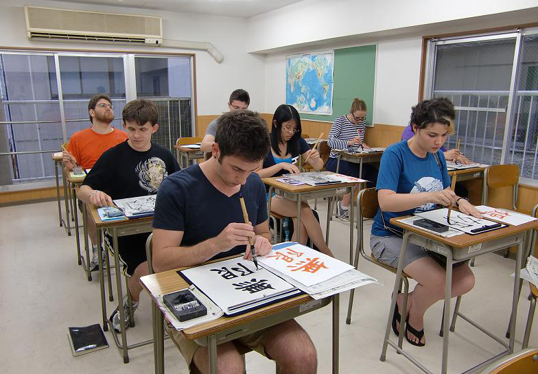 KCP students learning shodo, Japanese calligraphy.