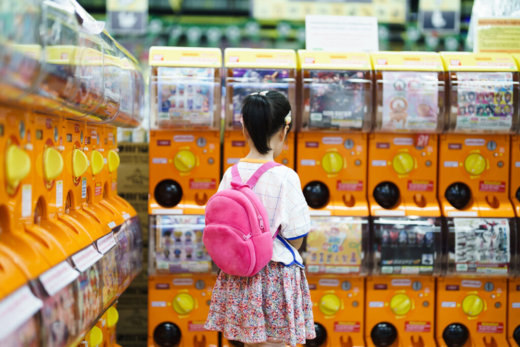 Gashapon machines with girl