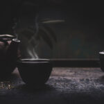 Steaming tea on black