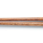 Top view of wooden chopsticks on white background