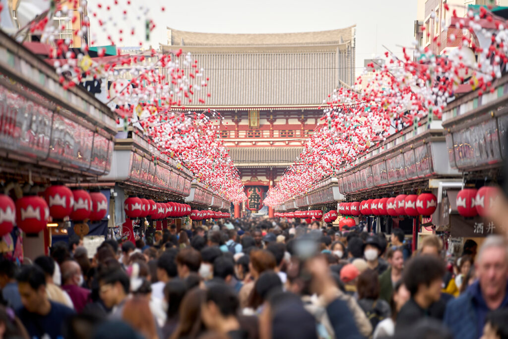 Sensoji Temple's crowded Nakamise Street. Japanese tourist destination.