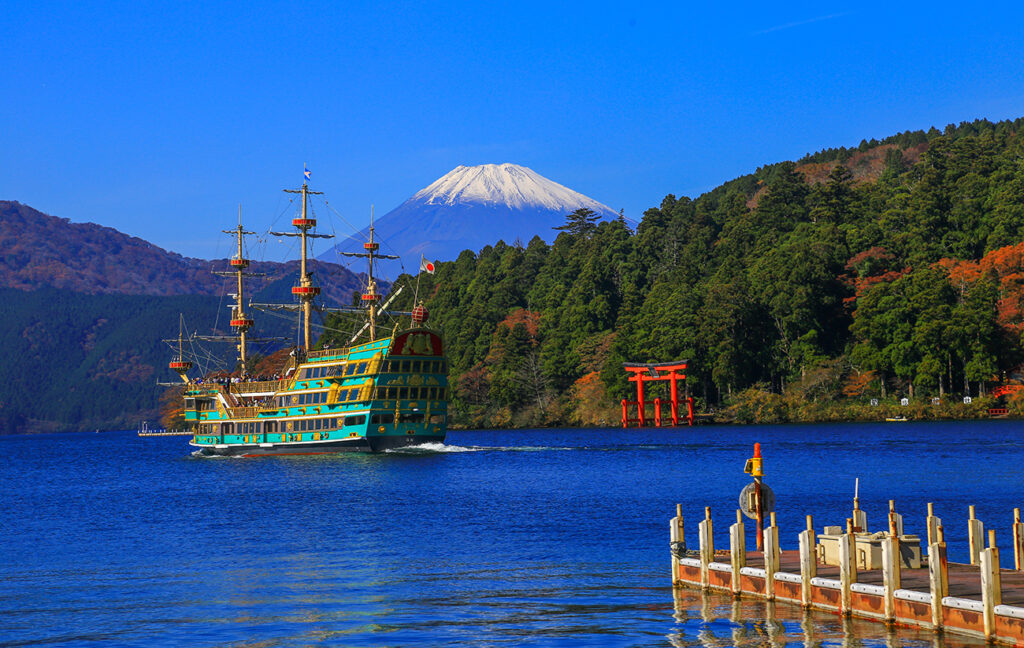 Lake Ashinoko was formed in the caldera of Mount Hakone after the volcano's last eruption 3000 years ago. Today, the lake with Mount Fuji and boat in the background is the best viwe point in Hakone