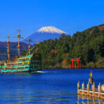 Lake Ashinoko was formed in the caldera of Mount Hakone after the volcano's last eruption 3000 years ago. Today, the lake with Mount Fuji and boat in the background is the best viwe point in Hakone