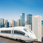 High-Speed Train in Modern Urban Cityscape