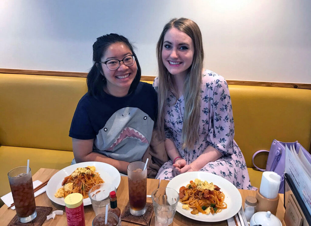 KCP student and friend about to eat pasta