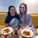 KCP student and friend about to eat pasta